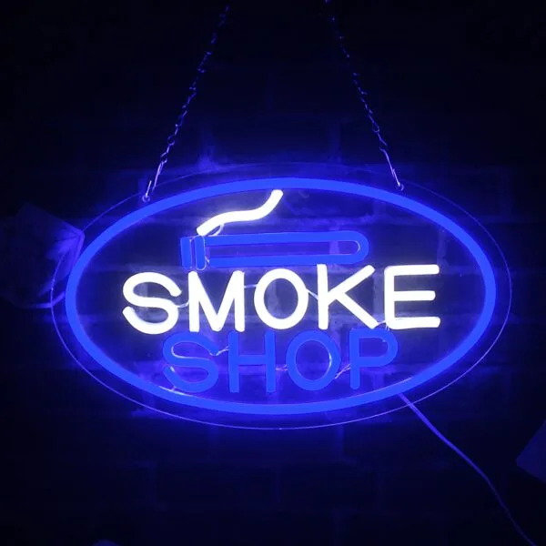 Oval blue neon 'SMOKE SHOP' sign with lit cigarette graphic.