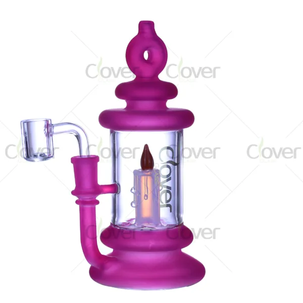 Unique candle style glass oil rigs with flame decoration inside, made by Clover Glass in green, yellow, pink, and purple
