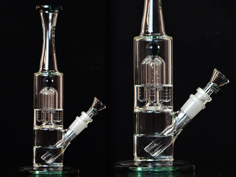 sleek glass water pipe on a wooden tabletop