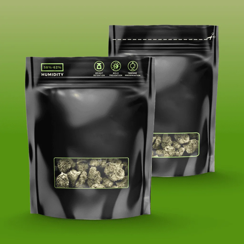 Two black humidity-controlled cannabis bags with clear windows showing dried flower buds.