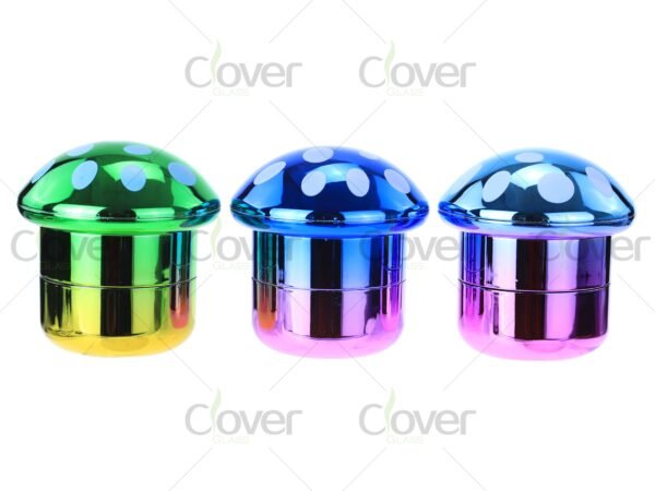 Colorful mushroom-shaped metal herb grinders in bulk display — 2-piece spice crusher set for dry herb by CloverGlass