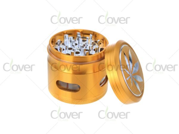 Metal herb grinders with engraved cannabis leaf design — 4-piece dry herb crushers in assorted colors, bulk display by CloverGlass