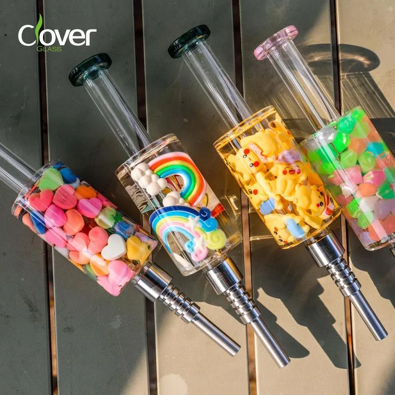 Colorful Clover Glass dab straws featuring hearts, rainbows, Pikachu, and geometric cube designs.