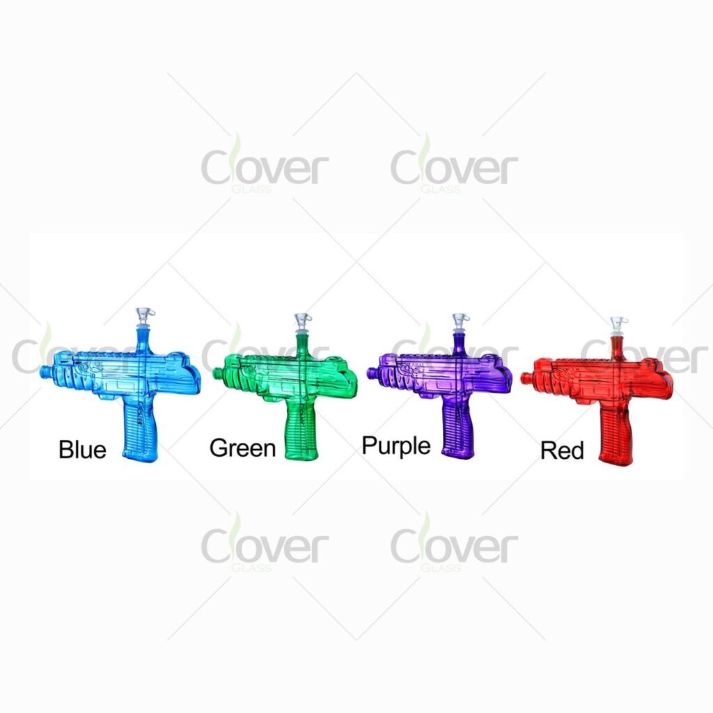 Four colorful gun-shaped glass water pipes in blue, green, purple, and red.