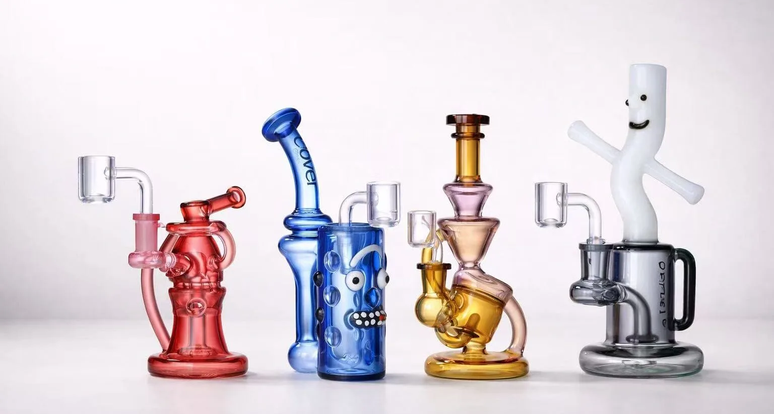 Vibrant collection of unique glass dab rigs with bangers, diverse colors and designs.