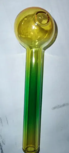Gradient yellow-green glass oil burner pipe with spherical bowl and straight stem.