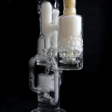 Ash catcher troubleshooting examples showing loose fit, tilted setup, and splashback from overfilled water
