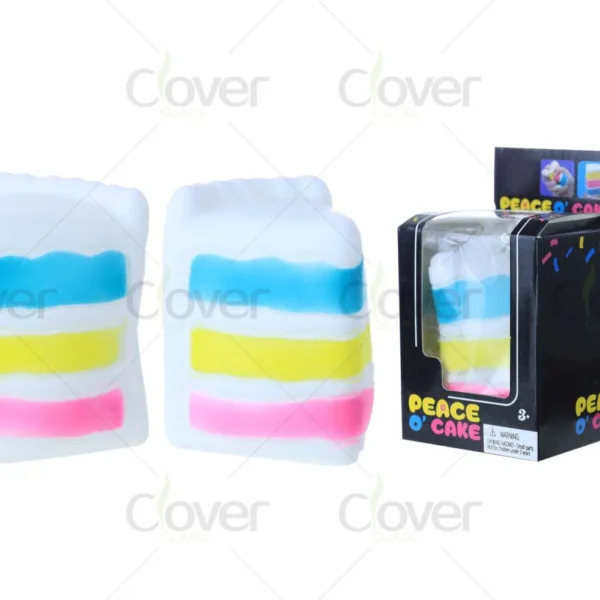Peace O' Cake squishy toy, colorful layered cake slice, packaged and loose.