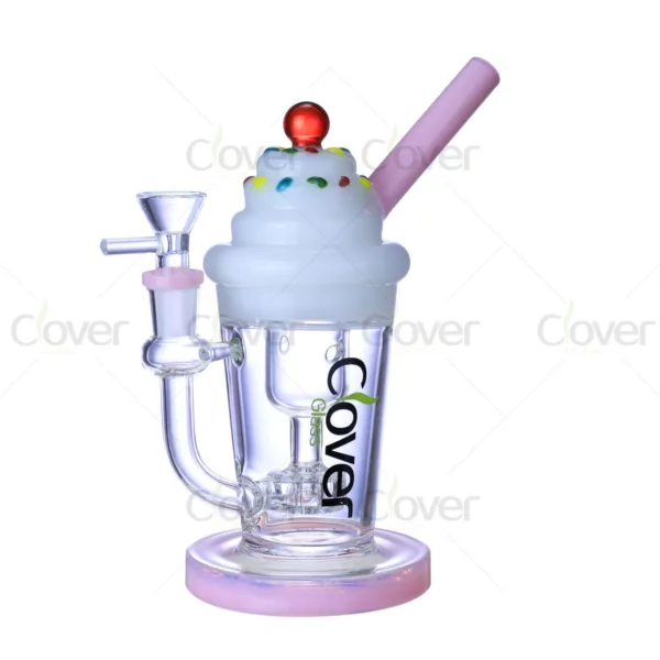 Novelty cupcake glass bong with sprinkles, pink straw mouthpiece, and cherry top.