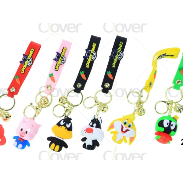 Looney Tunes character keychains with colorful straps, bells, and cartoon figures.