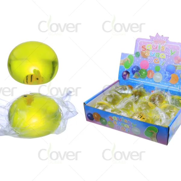 Yellow squishy sugar balls with bee inserts, individually wrapped in a display box.