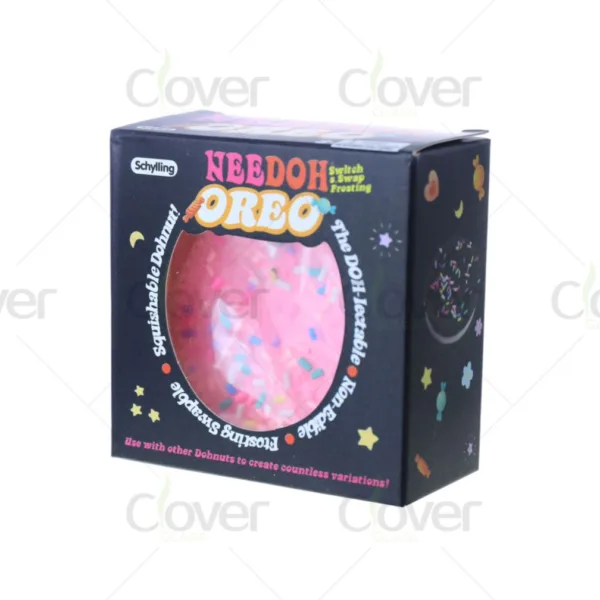 Schylling Needoh Oreo squishable pink donut toy in black box with colorful sprinkles.
