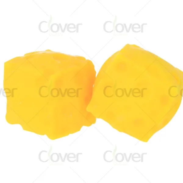 Two bright yellow cheese cubes, one featuring distinct holes, on white.