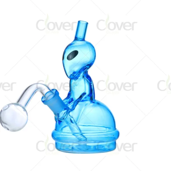 Blue glass alien novelty bong with clear curved oil burner attachment.