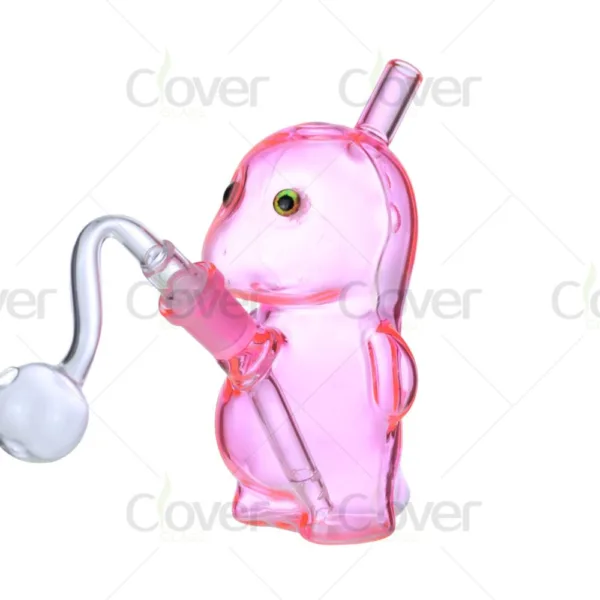 Pink glass character pipe with green eyes and clear oil burner attachment.