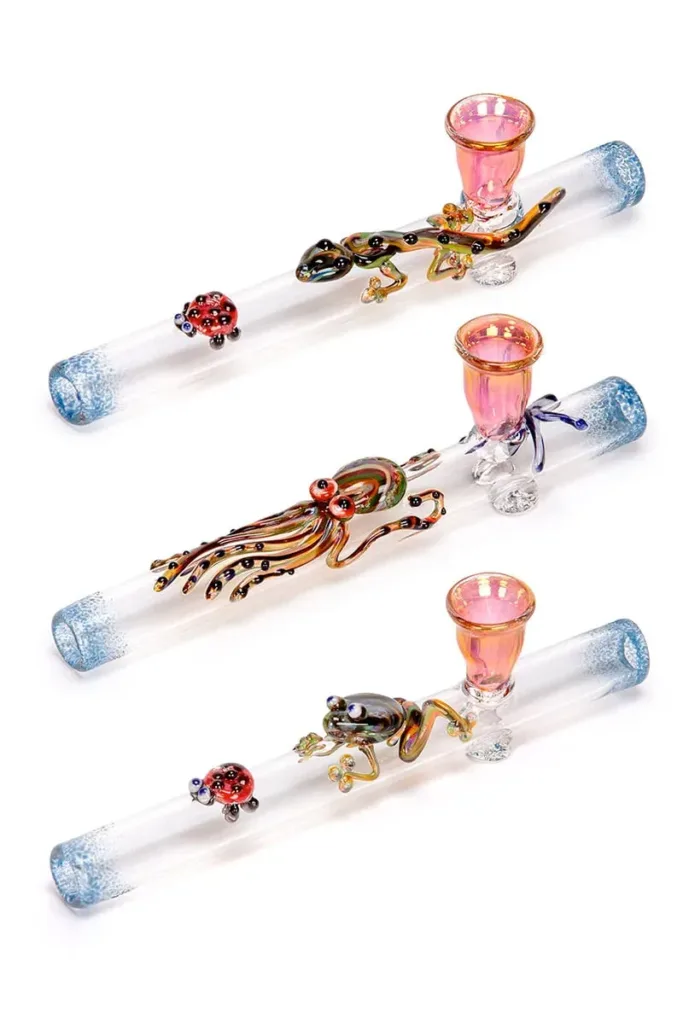 Three clear glass steamrollers with gecko, octopus, frog, ladybug animal designs, pink bowls.