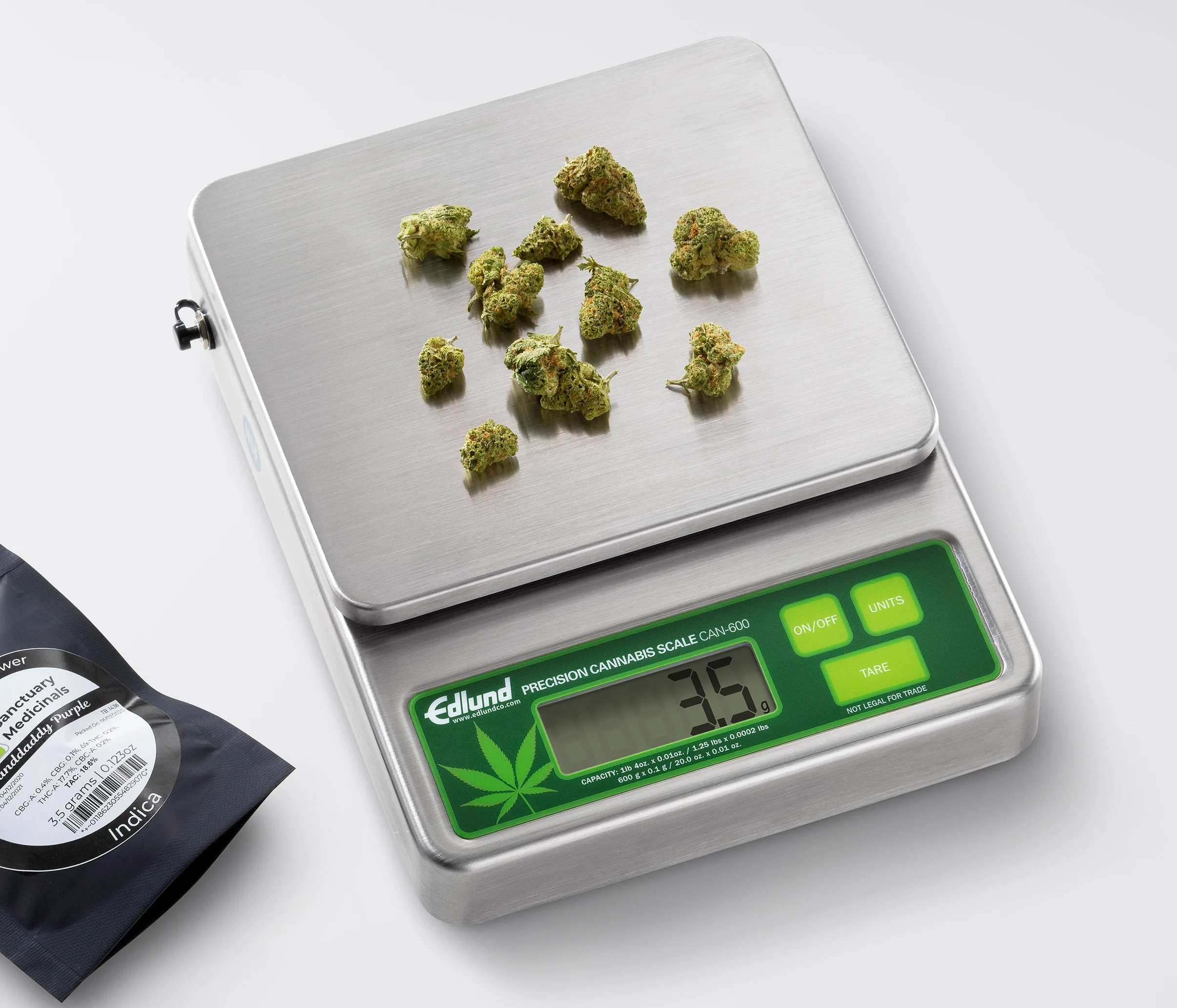 Edlund precision cannabis scale weighing 3.5 grams of marijuana buds.